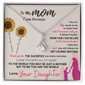 Necklace in a box with a sentimental message to a mother from her daughter, featuring sunflowers and a silhouette of a mother and child.