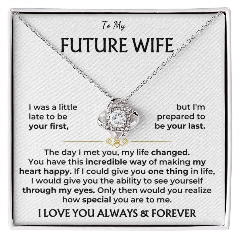 Necklace with heart-shaped pendant on a card addressed to 'Future Wife' with romantic message.